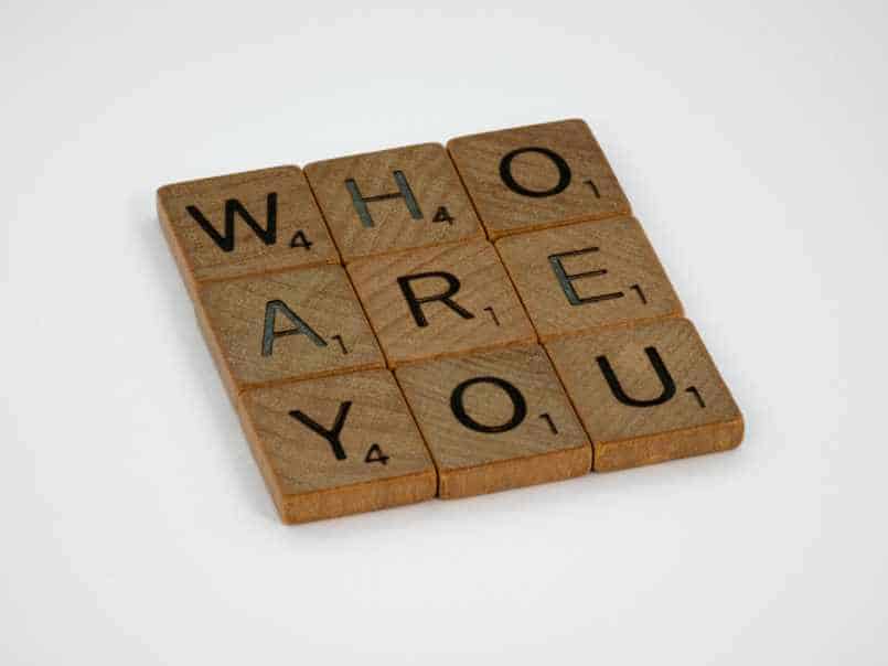 scrabble pieces saying 'Who Are You'